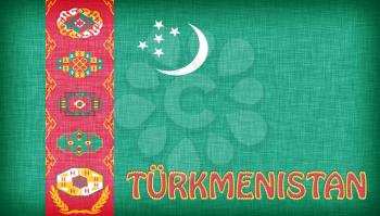 Linen flag of Turkmenistan with letters stitched on it