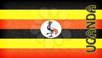 Linen flag of Uganda with letters stiched on it