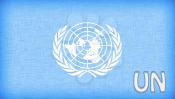 Linen flag of the UN with letters stiched on it