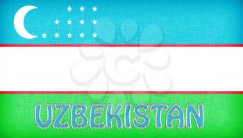 Linen flag of Uzbekistan with letters stiched on it
