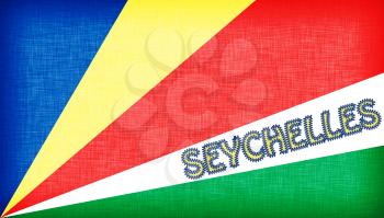 Flag of the Seychelles stitched with letters, isolated