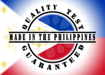 Quality test guaranteed stamp with a national flag inside, Philippines