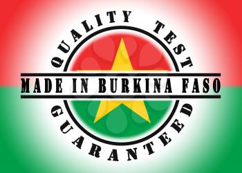 Quality test guaranteed stamp with a national flag inside, Burkina Faso