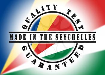 Quality test guaranteed stamp with a national flag inside, Seychelles