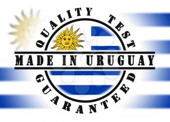 Quality test guaranteed stamp with a national flag inside, Uruguay