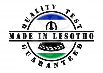Quality test guaranteed stamp with a national flag inside, Lesotho