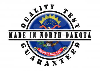Quality test guaranteed stamp with a state flag inside, North Dakota