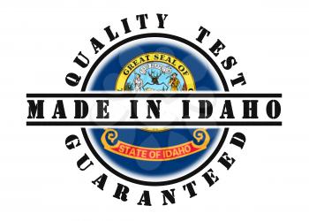 Quality test guaranteed stamp with a state flag inside, Idaho
