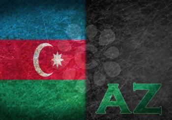 Old rusty metal sign with a flag and country abbreviation - Azerbaijan