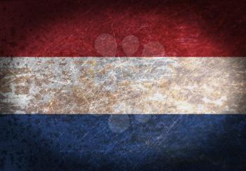 Old rusty metal sign with a flag - the Netherlands