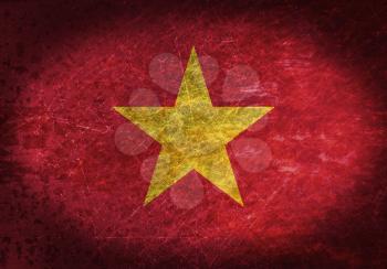 Old rusty metal sign with a flag - Vietnam