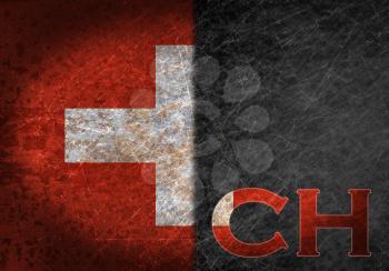 Old rusty metal sign with a flag and country abbreviation - Switzerland