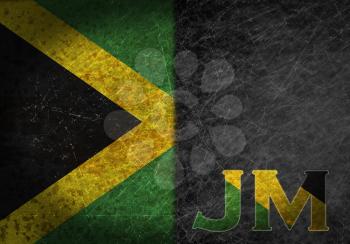 Old rusty metal sign with a flag and country abbreviation - Jamaica