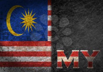 Old rusty metal sign with a flag and country abbreviation - Malaysia