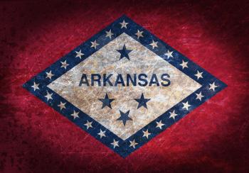 Old rusty metal sign with a flag - Arkansas