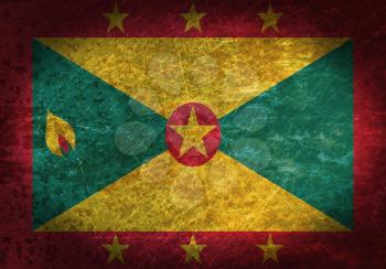 Old rusty metal sign with a flag - Grenada