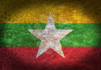 Old rusty metal sign with a flag - Myanmar