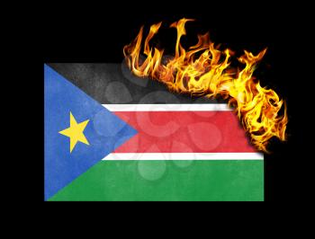 Flag burning - concept of war or crisis - South Sudan
