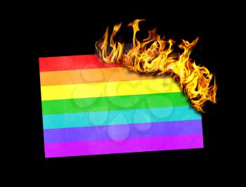 Flag burning - concept of war or crisis - Rainbow flag