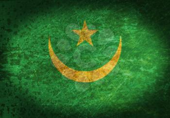 Old rusty metal sign with a flag - Mauritania