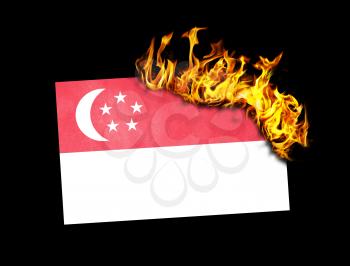 Flag burning - concept of war or crisis - Singapore