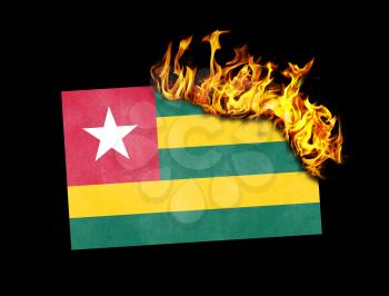 Flag burning - concept of war or crisis - Togo