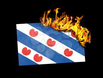 Flag burning - concept of war or crisis - Friesland