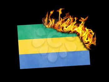 Flag burning - concept of war or crisis - Gabon