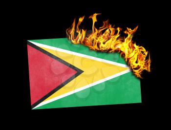 Flag burning - concept of war or crisis - Guyana