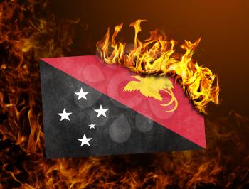 Flag burning - concept of war or crisis - Papua New Guinea