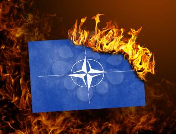 Flag burning - concept of war or crisis - NATO