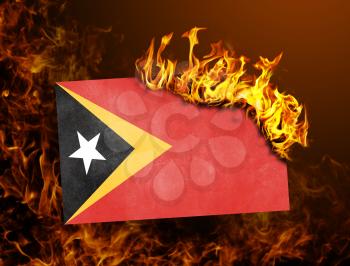 Flag burning - concept of war or crisis - East Timor