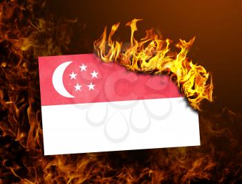 Flag burning - concept of war or crisis - Singapore
