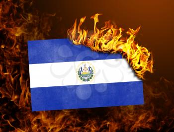 Flag burning - concept of war or crisis - El Salvador