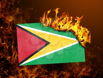 Flag burning - concept of war or crisis - Guyana
