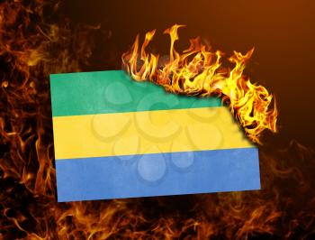 Flag burning - concept of war or crisis - Gabon