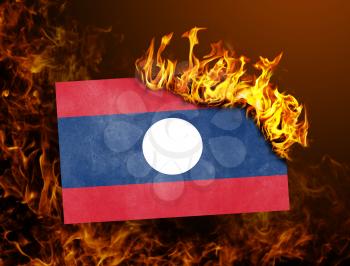 Flag burning - concept of war or crisis - Laos