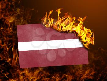 Flag burning - concept of war or crisis - Latvia