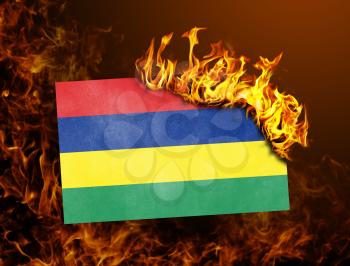 Flag burning - concept of war or crisis - Mauritius