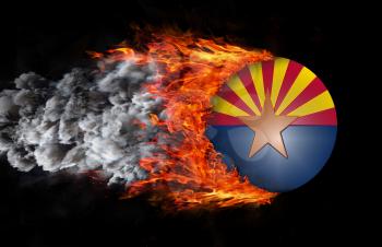 Concept of speed - Flag with a trail of fire and smoke - Arizona