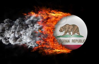 Concept of speed - Flag with a trail of fire and smoke - California