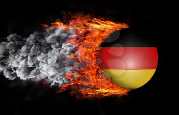 Concept of speed - Flag with a trail of fire and smoke - Germany