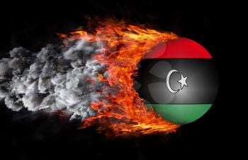 Concept of speed - Flag with a trail of fire and smoke - Libya