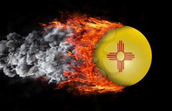 Concept of speed - Flag with a trail of fire and smoke - New Mexico