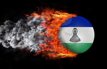 Concept of speed - Flag with a trail of fire and smoke - Lesotho