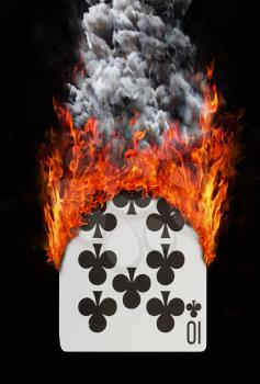 Playing card with fire and smoke, isolated on white - Ten of clubs