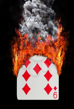 Playing card with fire and smoke, isolated on white - Nine of diamonds