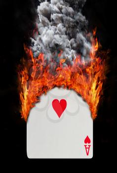 Playing card with fire and smoke, isolated on white - Ace of hearts