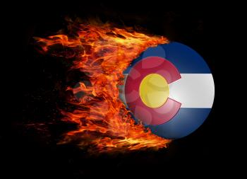 Concept of speed - US state flag with a trail of fire - Colorado