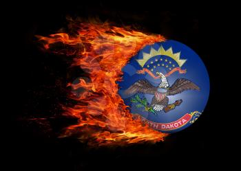 Concept of speed - US state flag with a trail of fire - North Dakota